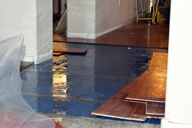 Professional Water Damage Restoration technician working in Whiting, WI
